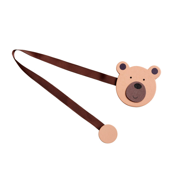 Cute wooden magnet tie in a bear design. Use it to hold back your blockout blinds